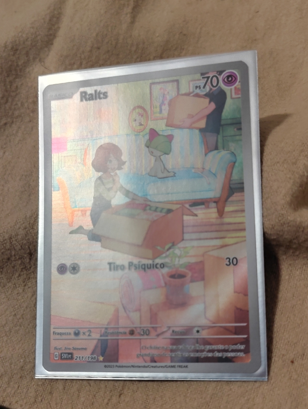 Pokemon Ralts Holographic Card - Green, Pink, Blue